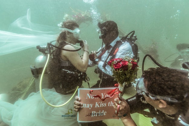 Once the ceremony was over, the "Now you may kiss the bride" placard was presented...